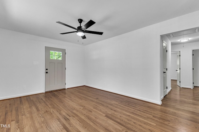 2408 Glascock St, Raleigh, NC 27610 - empty room featuring attic access, ceiling fan, and wood finished floors