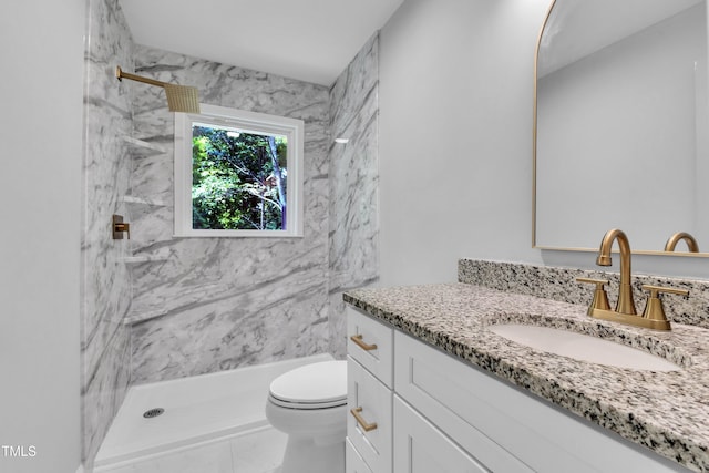 2408 Glascock St, Raleigh, NC 27610 - bathroom with vanity and a marble finish shower
