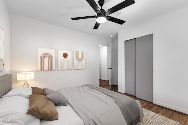 2408 Glascock St, Raleigh, NC 27610 - bedroom with wood finished floors, a closet, and a ceiling fan