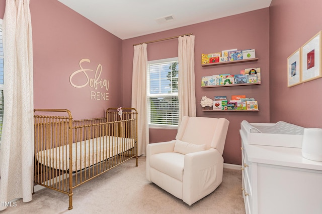 1425 Herb Garden Way, Apex, NC 27502 - bedroom with light colored carpet and a nursery area
