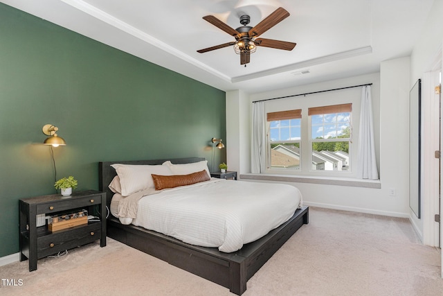 1425 Herb Garden Way, Apex, NC 27502 - bedroom featuring carpet floors, a raised ceiling, and a ceiling fan