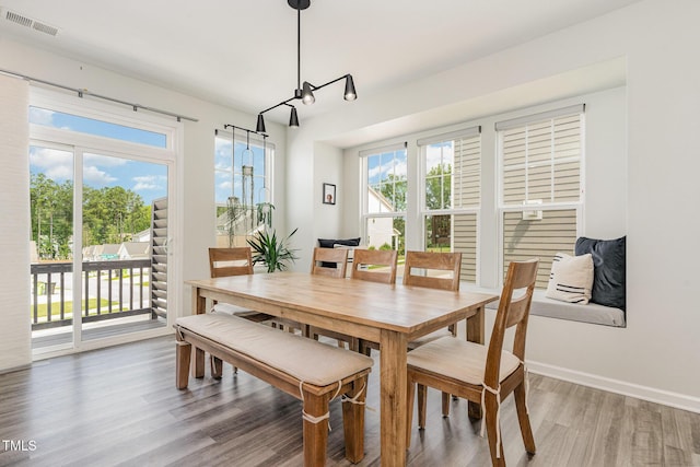 1425 Herb Garden Way, Apex, NC 27502 - dining room with light wood-type flooring and healthy amount of natural light