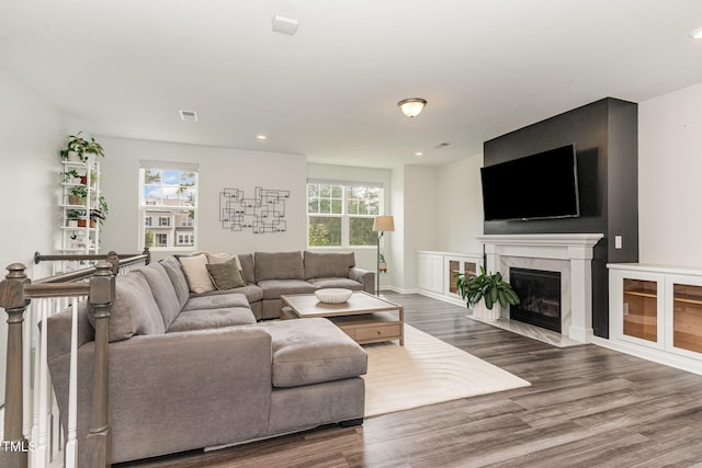 1425 Herb Garden Way, Apex, NC 27502 - living area with wood finished floors, recessed lighting, and a fireplace