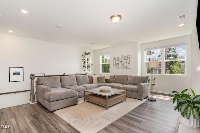 1425 Herb Garden Way, Apex, NC 27502 - living room featuring wood finished floors and recessed lighting