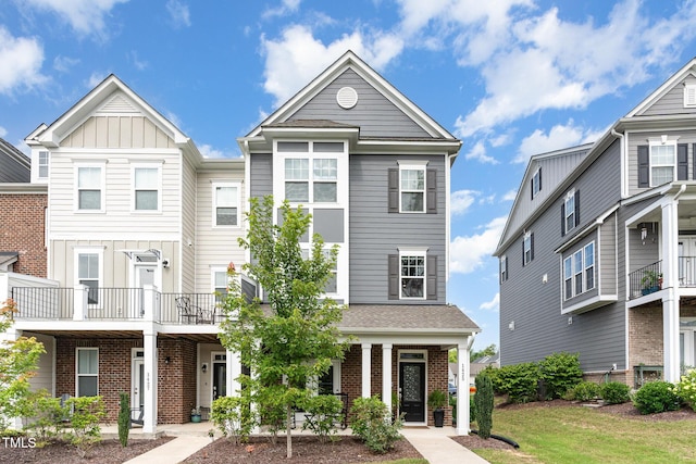 1425 Herb Garden Way, Apex, NC 27502 - view of front facade with brick siding and a porch