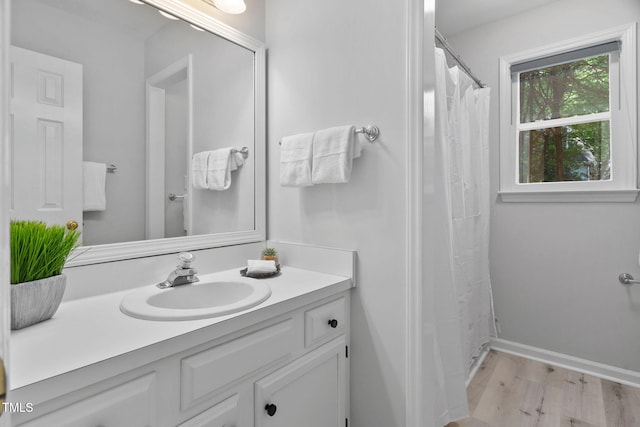 114 Dalmeny Dr, Cary, NC 27513 - full bathroom with vanity and wood finished floors
