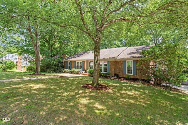 1920 Quail Ridge Rd, Raleigh, NC 27609 - ranch-style home featuring a front yard