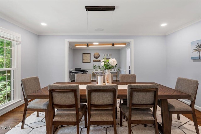 1920 Quail Ridge Rd, Raleigh, NC 27609 - dining room featuring wood finished floors, crown molding, and recessed lighting