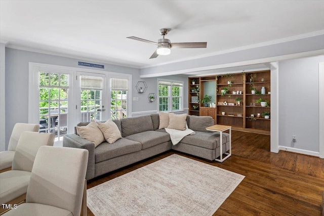 1920 Quail Ridge Rd, Raleigh, NC 27609 - living room featuring ornamental molding, ceiling fan, dark wood finished floors, and french doors