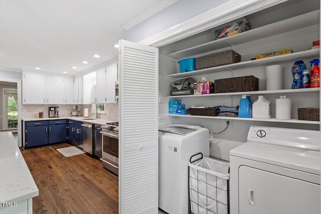1920 Quail Ridge Rd, Raleigh, NC 27609 - laundry area with washing machine and dryer, dark wood-style floors, crown molding, and recessed lighting