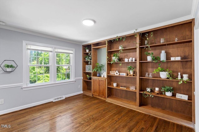 1920 Quail Ridge Rd, Raleigh, NC 27609 - interior space featuring dark wood-style floors and crown molding