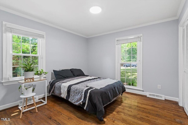 1920 Quail Ridge Rd, Raleigh, NC 27609 - bedroom featuring ornamental molding and wood finished floors