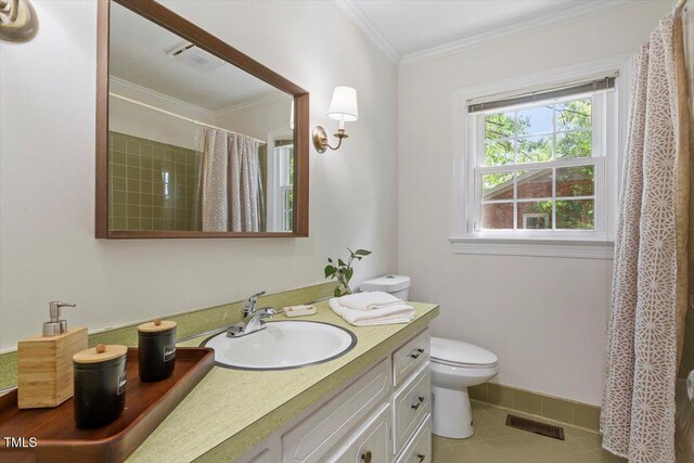 1920 Quail Ridge Rd, Raleigh, NC 27609 - full bathroom with vanity, crown molding, tile patterned floors, and curtained shower