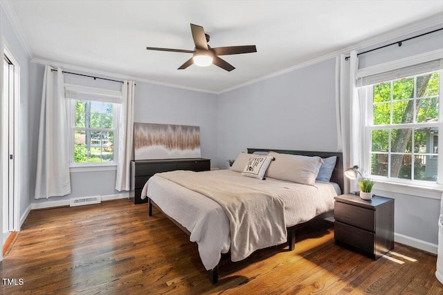 1920 Quail Ridge Rd, Raleigh, NC 27609 - bedroom with wood finished floors, ornamental molding, and ceiling fan