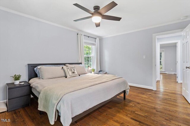 1920 Quail Ridge Rd, Raleigh, NC 27609 - bedroom with ornamental molding, wood finished floors, and ceiling fan