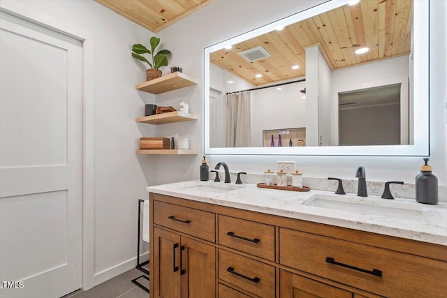 1920 Quail Ridge Rd, Raleigh, NC 27609 - full bath with wooden ceiling, double vanity, a shower with curtain, recessed lighting, and tile patterned flooring