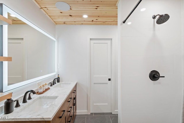 1920 Quail Ridge Rd, Raleigh, NC 27609 - full bath featuring wooden ceiling, double vanity, tile patterned floors, and a tile shower