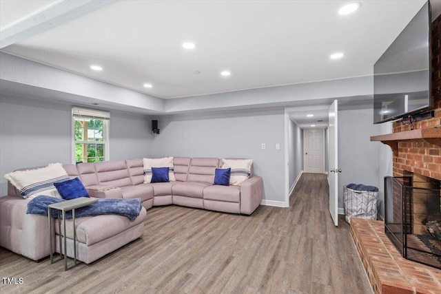 1920 Quail Ridge Rd, Raleigh, NC 27609 - living room with wood finished floors, a fireplace, and recessed lighting