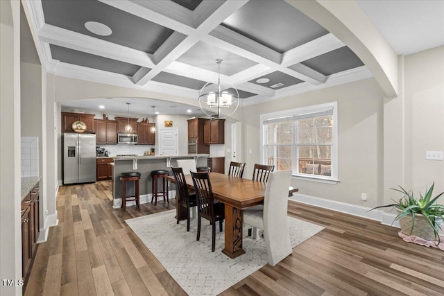 2981 Thurman Dairy, Wake Forest, NC 27587 - dining space with wood finished floors, arched walkways, coffered ceiling, beam ceiling, and recessed lighting