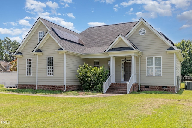 145 Adams Pointe Ct, Angier, NC 27501 - view of front of house featuring crawl space, roof mounted solar panels, a front lawn, roof with shingles, and a ceiling fan