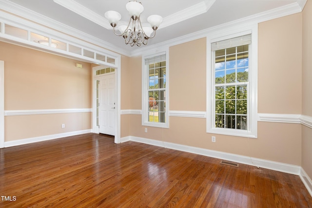 145 Adams Pointe Ct, Angier, NC 27501 - unfurnished room featuring a chandelier, wood finished floors, and crown molding