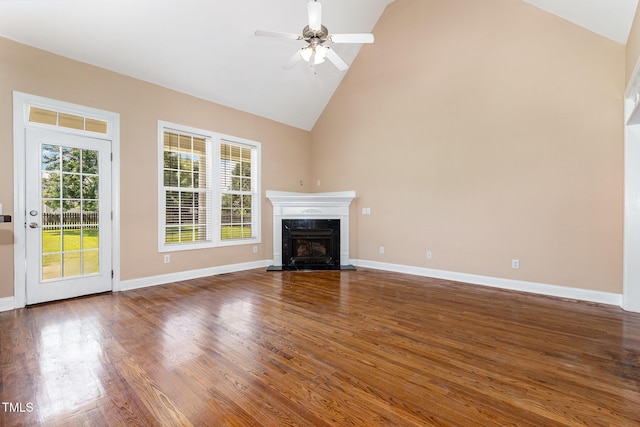 145 Adams Pointe Ct, Angier, NC 27501 - unfurnished living room featuring a ceiling fan, high vaulted ceiling, a high end fireplace, and wood finished floors