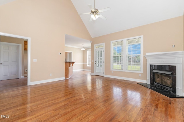 145 Adams Pointe Ct, Angier, NC 27501 - unfurnished living room with high vaulted ceiling, a fireplace, light wood finished floors, and ceiling fan