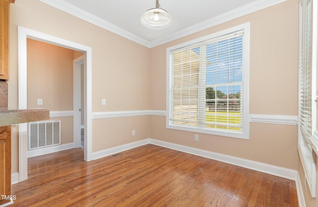 145 Adams Pointe Ct, Angier, NC 27501 - empty room featuring light wood finished floors and crown molding
