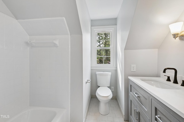 109 Grey Fox Ct, Cary, NC 27511 - bathroom featuring vaulted ceiling, vanity, tile patterned floors, and bathtub / shower combination