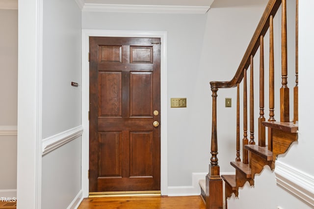 109 Grey Fox Ct, Cary, NC 27511 - entrance foyer with stairs, crown molding, and wood finished floors