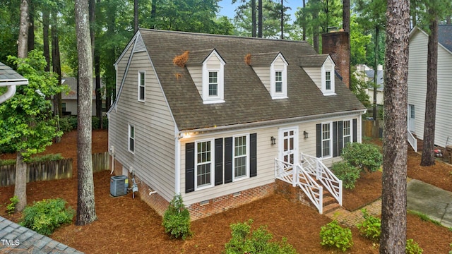 109 Grey Fox Ct, Cary, NC 27511 - new england style home with a chimney, crawl space, and a shingled roof