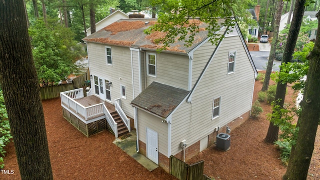 109 Grey Fox Ct, Cary, NC 27511 - back of house with a deck, a shingled roof, stairway, and a chimney