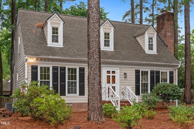 109 Grey Fox Ct, Cary, NC 27511 - new england style home featuring a chimney and a shingled roof