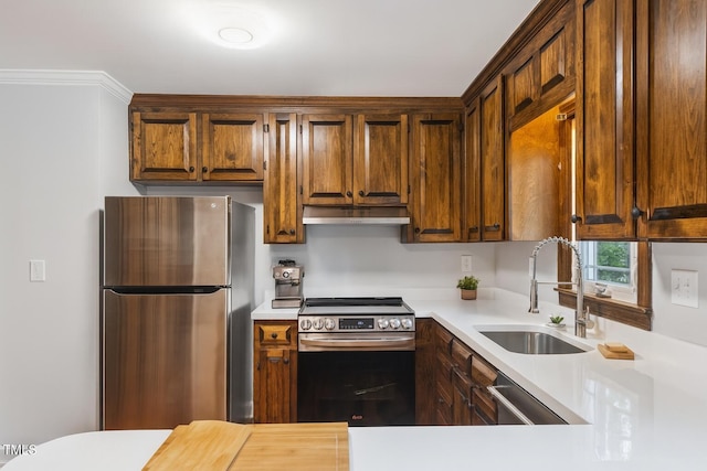 109 Grey Fox Ct, Cary, NC 27511 - kitchen featuring stainless steel appliances, under cabinet range hood, and light countertops