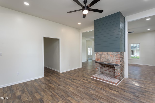 112 N Sellers St, Selma, NC 27576 - unfurnished living room with healthy amount of natural light, dark wood finished floors, ceiling fan, and recessed lighting