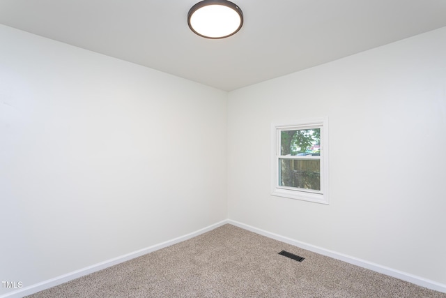 112 N Sellers St, Selma, NC 27576 - carpeted empty room with baseboards