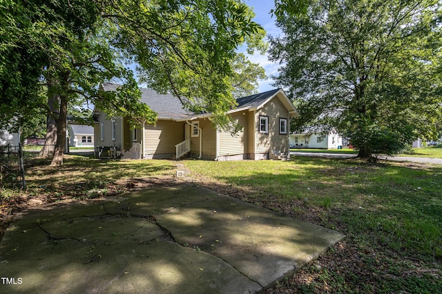 112 N Sellers St, Selma, NC 27576 - view of home's exterior with a lawn