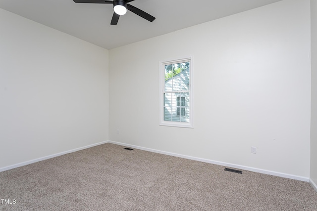 112 N Sellers St, Selma, NC 27576 - carpeted spare room with a ceiling fan and baseboards