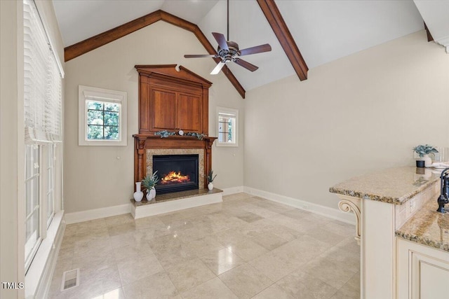 3728 Westbury Lake Dr, Raleigh, NC 27603 - unfurnished living room with a ceiling fan and a glass covered fireplace