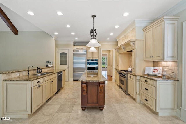 3728 Westbury Lake Dr, Raleigh, NC 27603 - kitchen featuring cream cabinets, high quality appliances, a center island with sink, ornamental molding, and decorative backsplash