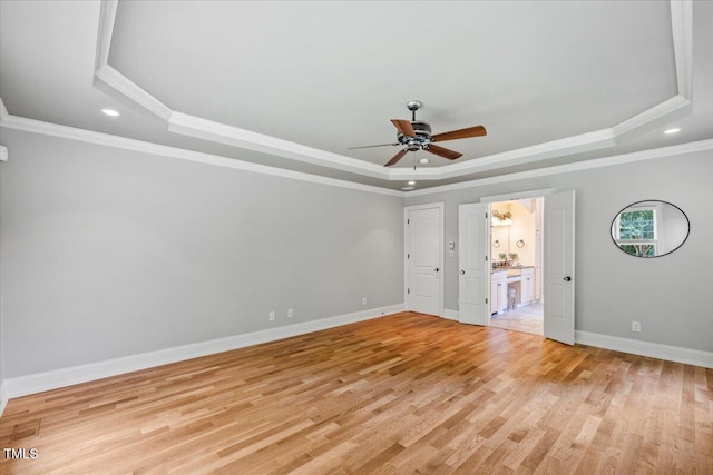 3728 Westbury Lake Dr, Raleigh, NC 27603 - unfurnished bedroom with a raised ceiling, recessed lighting, light wood finished floors, ornamental molding, and a ceiling fan