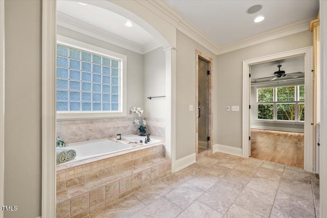 3728 Westbury Lake Dr, Raleigh, NC 27603 - full bath with a garden tub, a stall shower, ornamental molding, ceiling fan, and stone finish floors
