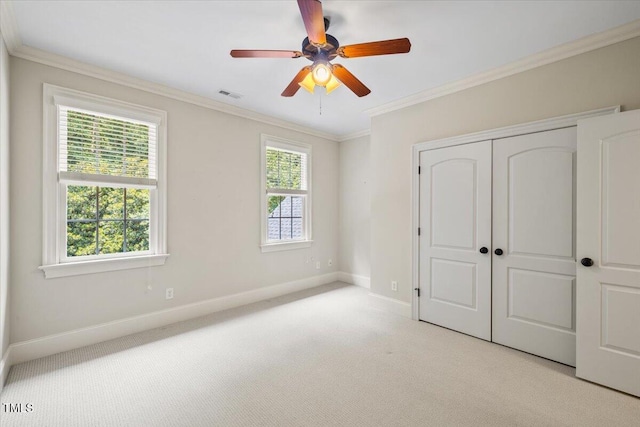 3728 Westbury Lake Dr, Raleigh, NC 27603 - unfurnished bedroom featuring carpet, ornamental molding, a closet, and ceiling fan