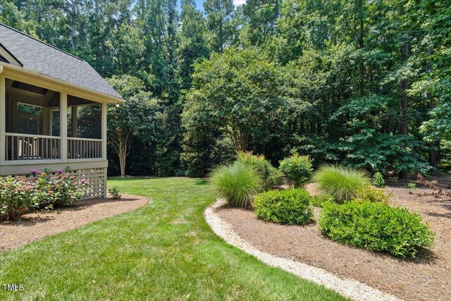 3728 Westbury Lake Dr, Raleigh, NC 27603 - view of green lawn with a sunroom