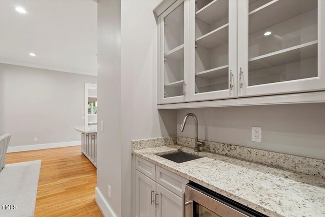 1103 Roosevelt Dr, Chapel Hill, NC 27514 - indoor wet bar with light wood-style floors and recessed lighting