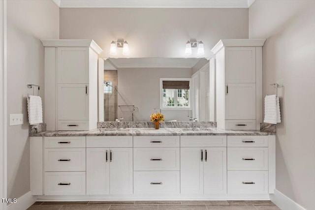 1103 Roosevelt Dr, Chapel Hill, NC 27514 - full bath with double vanity, tiled shower, and ornamental molding