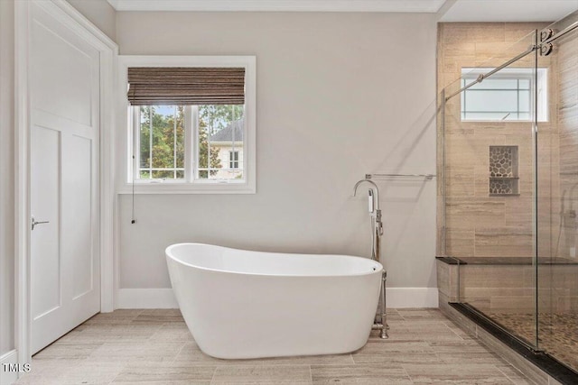 1103 Roosevelt Dr, Chapel Hill, NC 27514 - full bathroom with a freestanding tub and a shower stall