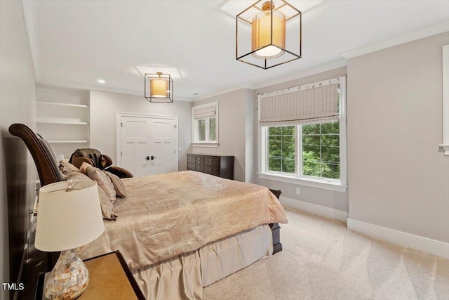 1103 Roosevelt Dr, Chapel Hill, NC 27514 - bedroom with crown molding and carpet