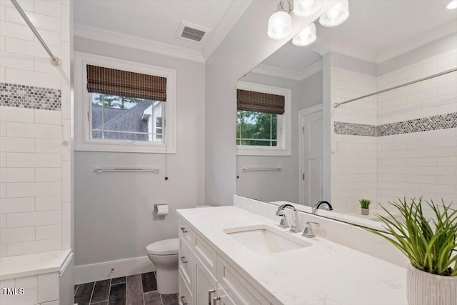 1103 Roosevelt Dr, Chapel Hill, NC 27514 - full bathroom featuring vanity, tiled shower, and ornamental molding