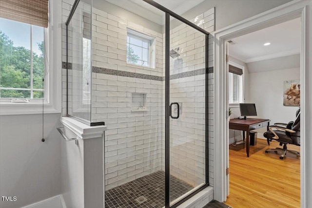 1103 Roosevelt Dr, Chapel Hill, NC 27514 - full bath with wood finished floors, a stall shower, and ornamental molding
